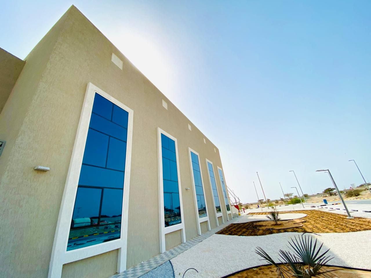 Dubai Communities 5 Tall white framed aluminium windows on a building corner - Zealcon
