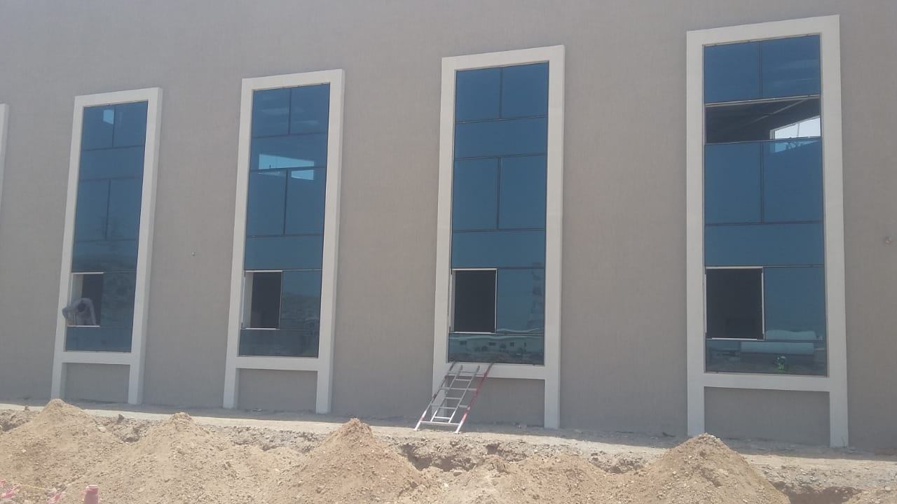 Dubai Communities 8 Four tall slim windows on a building facade - Zealcon