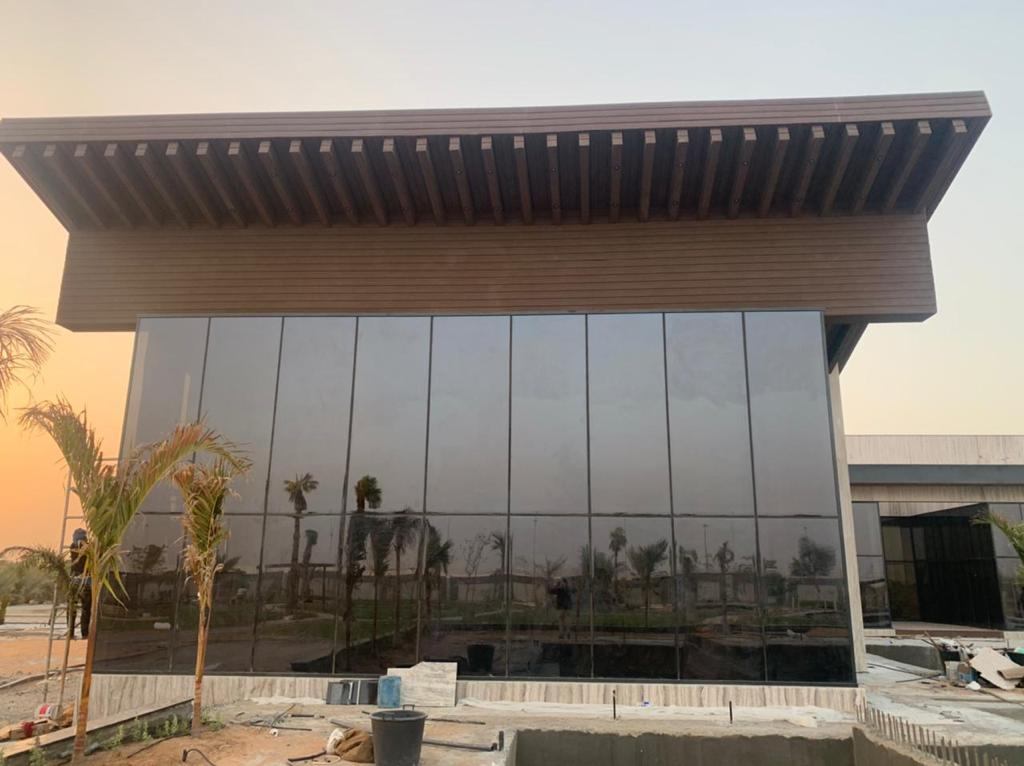 Structural Glazing & Glass Facades 7 Villa glass facade with timber canopy at sunset - Zealcon