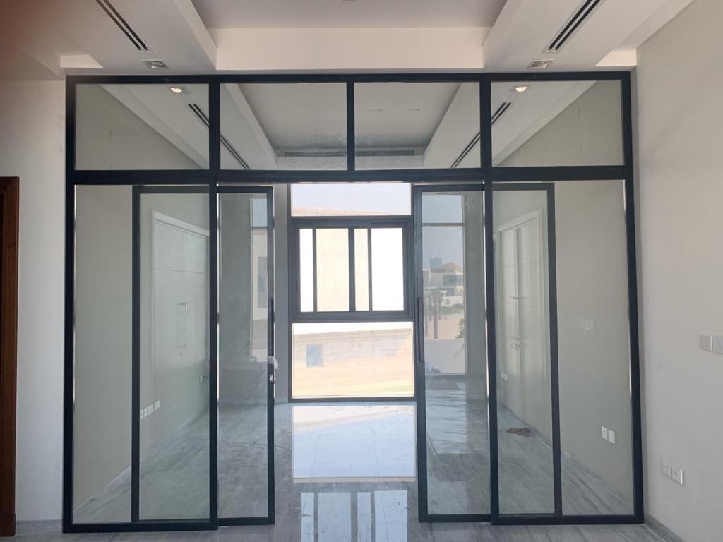 Smart Glass 6 Black framed double door glass partition with fixed glazing panels - Zealcon