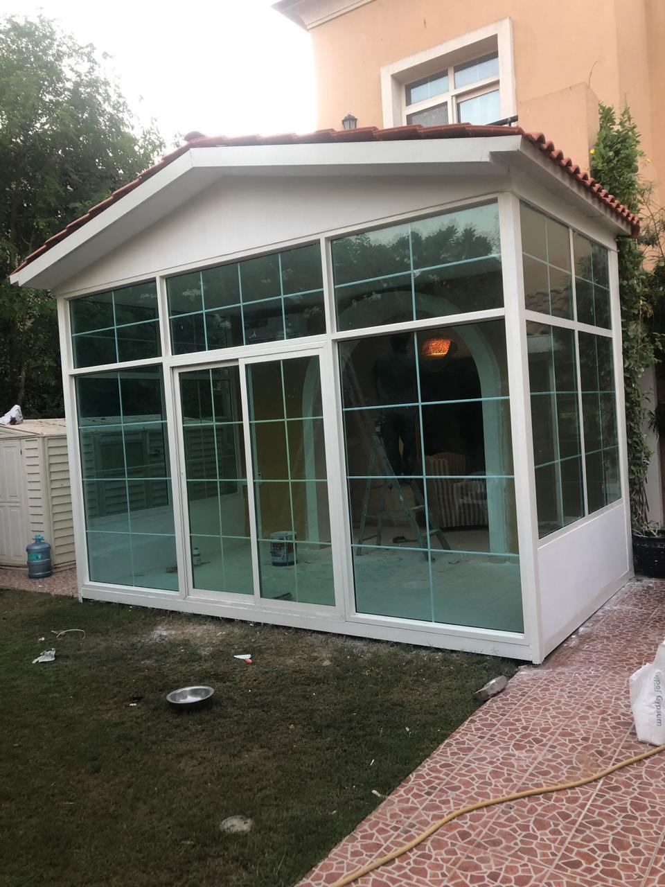 Sunrooms & Conservatories 4 White grid glazed sunroom with pitched roof in a villa garden - Zealcon