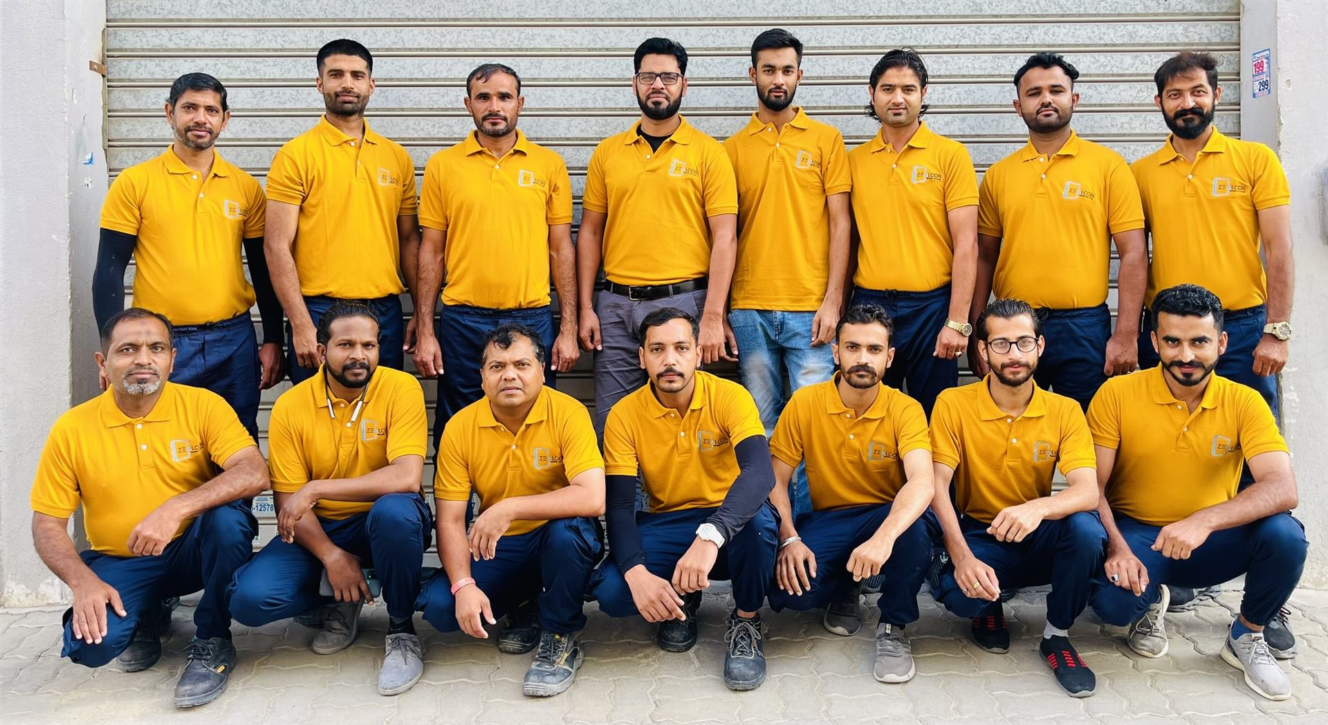 Facade Maintenance 7 The Zealcon fabrication and installation team in company uniform - Zealcon